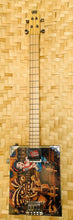 Load image into Gallery viewer, Electric Cigar Box Guitar Tiki Traveler Edition  - Ruby's Dilemma by Big Toe